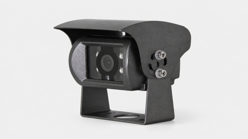 Black bracket-mounted vehicle camera with sunshield on a light background